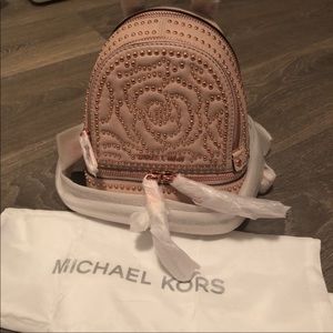 MK XS Messenger Backpack